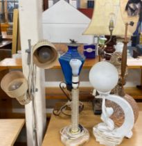 A group of mixed vintage table lamps.