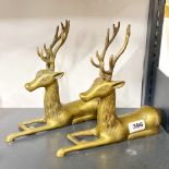 A pair of vintage brass stags, L. 25cm, H. 23cm.