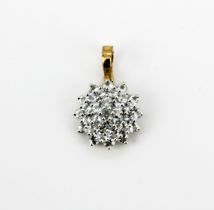 A hallmarked 9ct yellow gold and white gold cluster pendant set with round cut aquamarine, L. 2.