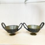 A pair of 19th century relief decorated bronze bowls, W. 19cm. H. 10cm.