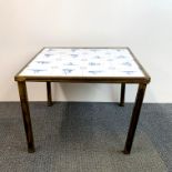 A set of early Dutch tiles inset into a 1970's gilt metal table, 54 x 54 x 40cm.