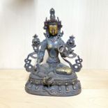 A Tibetan bronze figure of a seated Tara with jewelled decoration, H. 23cm.