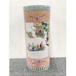 A Chinese Famille Rose decorated porcelain umbrella stand, H. 62cm.