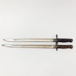 An Anderson bayonet stamped for 1907 and a further Remington U.S. bayonet stamped for 1917, L.
