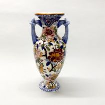 A large Gien French Faience vase, H. 39cm.