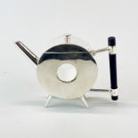 A Christopher Dresser style silver plated teapot, H. 14cm.