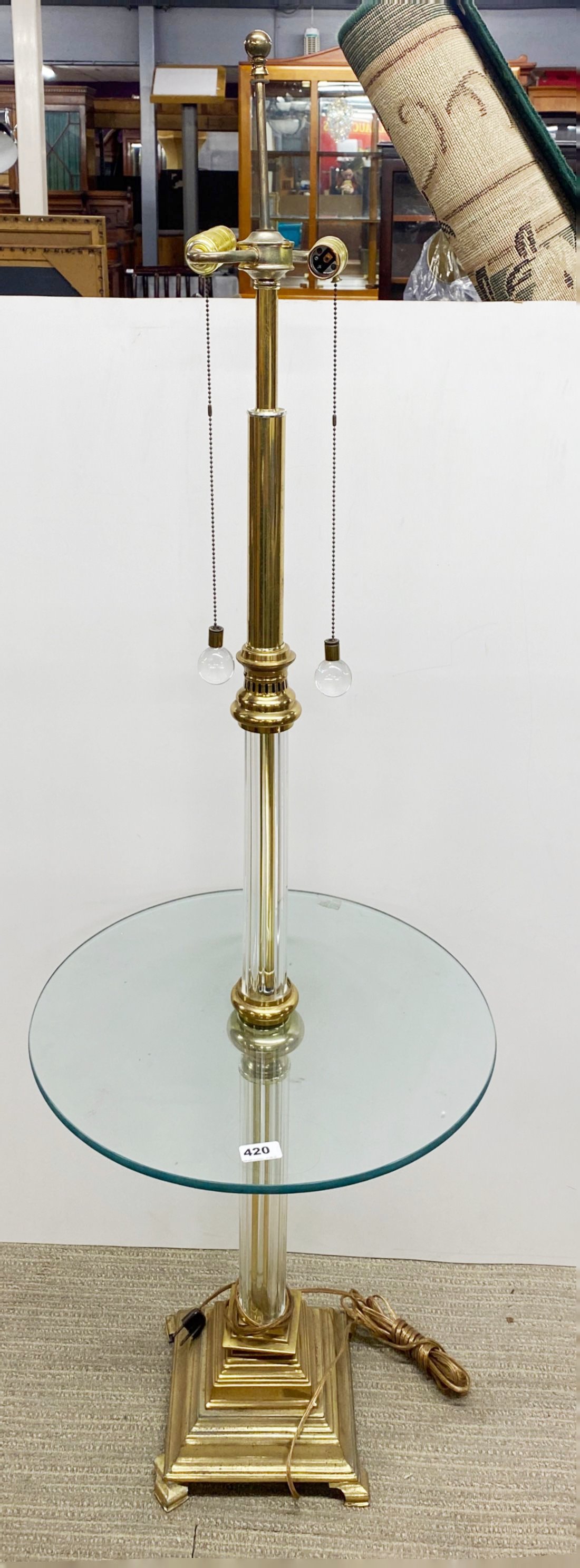 An impressive gilt brass and crystal column standard lamp, H. 145cm.