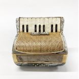 A 1950's accordion shaped cigarette box, 18 x 11 x 15cm.