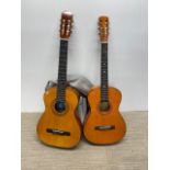 Two acoustic guitars and cases.