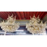 A pair of Swarovski crystal chandelier light fittings, H. 45cm, dia. 50cm.