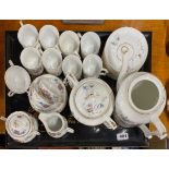 A porcelain coffee set and tray.