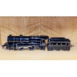 A 'O' gauge clock work locomotive and tender, L. 44cm.Refinished.