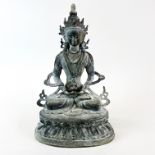 A Tibetan bronze figure of a seated Tara, H. 33cm.