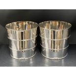 A pair of silver plated barrel shaped ice bucket, H. 20cm.