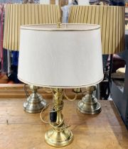 A pair of brass table lamps with silk shades together with a further brass desk lamp and shade, H.