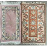 A heavy quality blue ground washed wool Chinese rug, 158 x 92cm. together with a pink ground Chinese