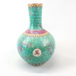 A Chinese famille rose decorated porcelain vase, H. 33cm.