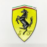 A cast iron Ferrari sign, H. 30cm.