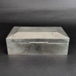 An Art Deco hallmarked silver covered cigarette box with engine turned decoration, 14 x 8.5 x 5.