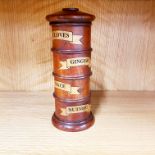 A turned wooden spice tower, H. 19cm.