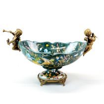 An ormolu mounted Continental porcelain centrepiece, W. 31cm. H. 20cm.