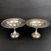 A pair of Fisher sterling silver bon bon dishes, Dia. 16cm. H. 10cm.