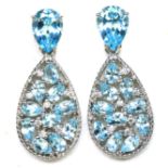 A pair of 925 silver drop earrings set with mixed cut Swiss blue topaz, L. 3.4cm.