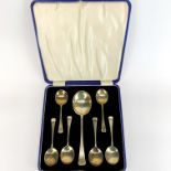 A cased heavy hallmarked silver set of fruit spoons.