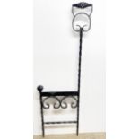 A early 20th century wrought iron boot scraper, H. 114cm.