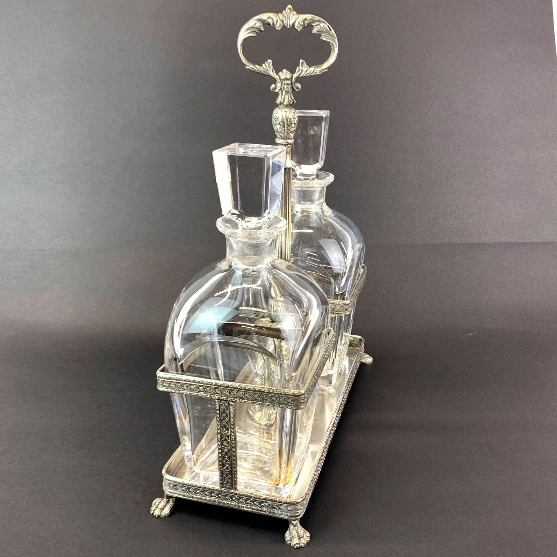 A silver plated decanter stand with two Kosta Sweden decanters, W. 25cm. H. 30cm. - Image 2 of 2