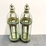 A pair of gilt metal large storm lanterns, H. 78cm.