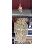 A 1970's gilt spiral chandelier light fitting, H. 44cm.