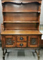 A carved oak Welsh dresser, 175 x 118 x 44cm.