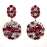 A pair of 925 silver drop earrings set with rubies and white stones, L. 3cm.