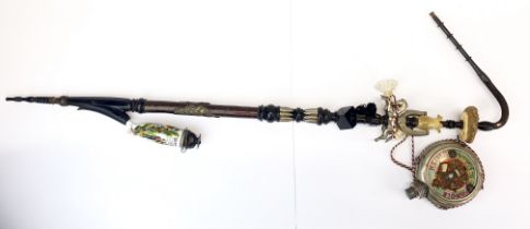 An impressive large German Imperial tobacco pipe, L. 108cm. with a spirit flask.