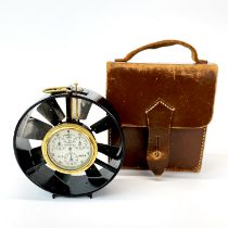 A leather cased mid-20th century wind velocity gauge, Dia. 10.5cm.