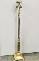 A heavy gilt standard lamp, H. 140cm.