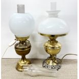 Two oil lamp style electric lights.