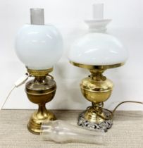 Two oil lamp style electric lights.