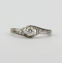 A 9ct white gold (marked 9K) diamond set ring, approx. 0.40ct total, (P).