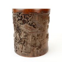 A finely carved Chinese bamboo brush pot, H. 16cm. Dia. 13cm.