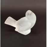 A Lalique frosted crystal figure of a bird faintely engraved 'Lalique France'.