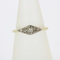 An Art Deco 18ct yellow gold diamond set ring, (N).
