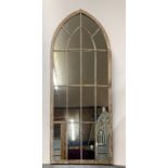A large handmade arched metal garden mirror, 66 x 159cm.