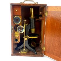 A Victorian cased brass microscope, case H. 30cm.
