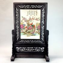 A Chinese porcelain and wooden framed table screen, H. 67cm.
