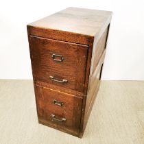 An oak two drawer filing cabinet with cast iron handles, 80 x 66 x 38cm.