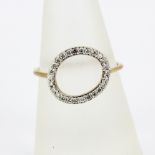A 9ct yellow gold ring set with brilliant cut diamonds, (P).