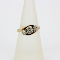 An antique 18ct gold and platinum diamond crossover ring, (M).