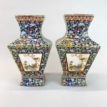 A pair of elaborately decorated Chinese porcelain rectangular vases, H. 25cm.
